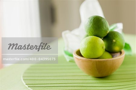 photo of delicious lime inside a bowl taken by daylight next to window