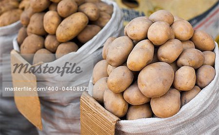 Sack of potatoes for sale on market place