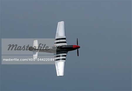 World War II era fighter airplane in flight