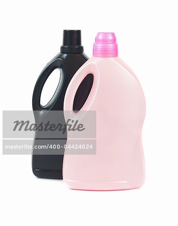 Pink and black plastic bottles isolated on white background