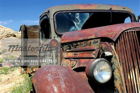 an old, abandoned chevy truck