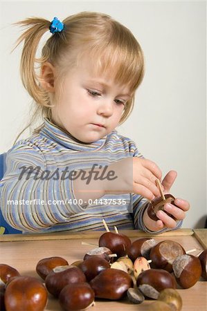 youn girl making toy animals