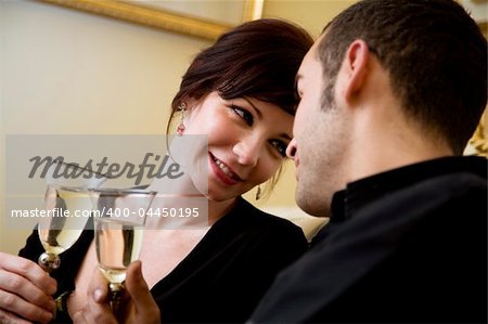 young couple celebrating some occasion and having fun