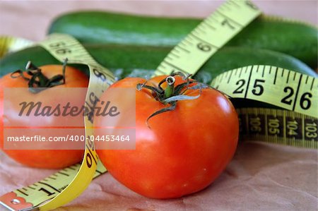 Tomatoes  & cucumber with measuring tape