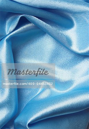 Blue silk folded cloth, soft and shiny.