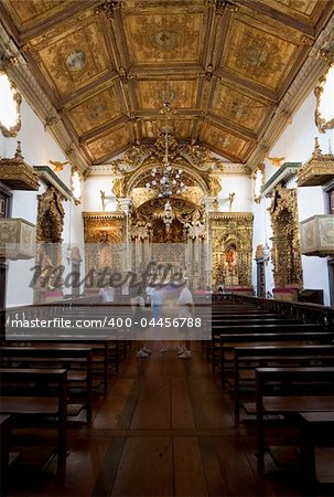 Igreja Matriz de Santo Antônio located in Tiradentes in the state of Minas Gerais Brazil. The church is dedicated to Santo Antônio (Saint Anthony). A half ton of gold was used to decorate its interior. The façade and the entrance were designed by Aleijadinho in 1732.