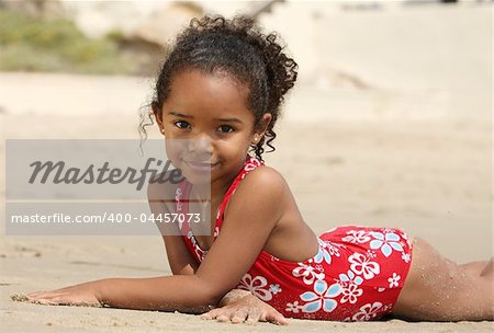 Cute little girl on a beach