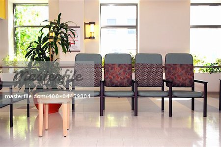 Waiting room in a hospital or clinic with empty chairs