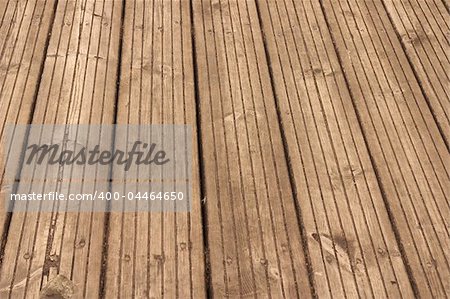 old, weathered wooden floor with perspective, taken outdoors
