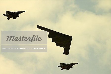 Americas amazing stealth bomber accompanied by two fighter jets