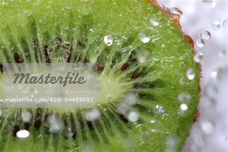 close up of drops on the kiwi