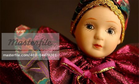 Little girl doll with pink dress