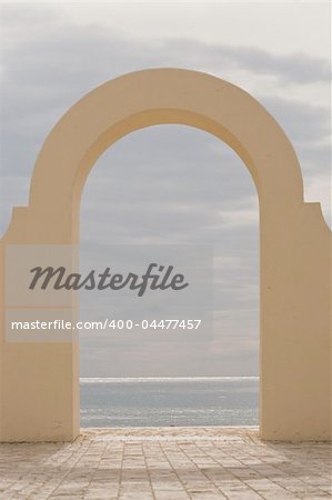 Archway on an Italian beach.