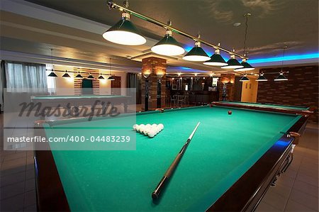Table for game in billiards in modern hotel