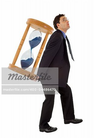 Businessman carrying a hourglass - concept for working under the pressure of a deadline - isolated
