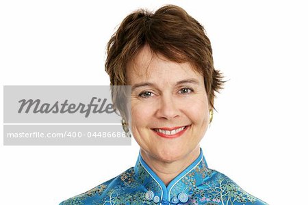 Portrait headshot of a pretty perky mature woman.  Isolated on white.