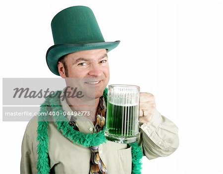 Man celebrating his Irish heritage on St. Patrick's Day, making a toast with green beer.