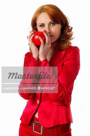 modern dressed woman holding red apple