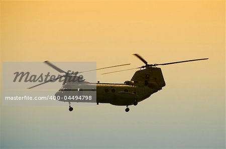 Military helicopter in flight