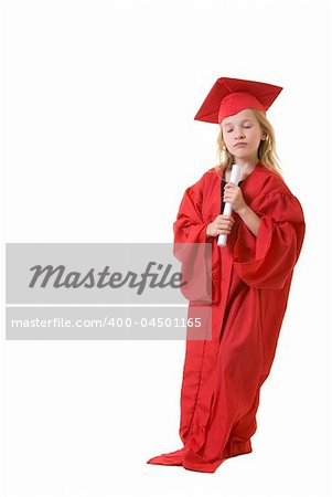 Cute little eight year old wearing red graduation cap and gown holding a diploma with eyes close and serious praying expression on white