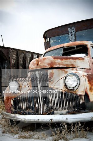 abandoned truck in rural wyoming junkyard