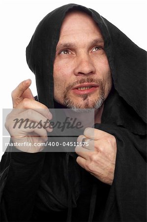 monk or maybe sorcerer in black clothing with hood