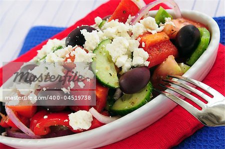 Greek salad with feta cheese and black kalamata olives