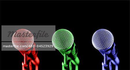 primary colored microphones on black