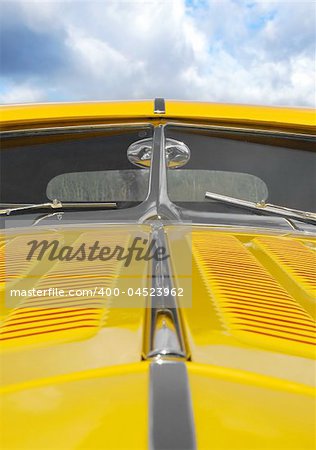 colorful vintage muscle car hood close-up
