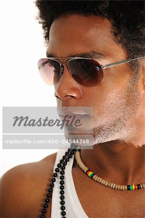 Portrait of young trendy african american man posing with sunglasses