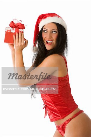 expressive girl in red underwear and christmas hat on with gift box