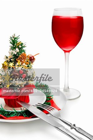 glass of red wine and Christmas decoration, isolated on white background