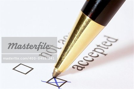 Pen marking Accepted Tick Box on Form