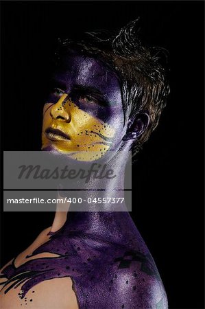 young male model wearing artistic bodypaint drawing