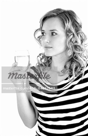 beautiful young girl is drinking champagne