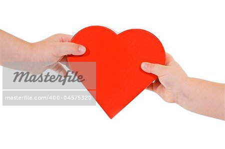 Sharing love concept - kids hands with red heart - isolated