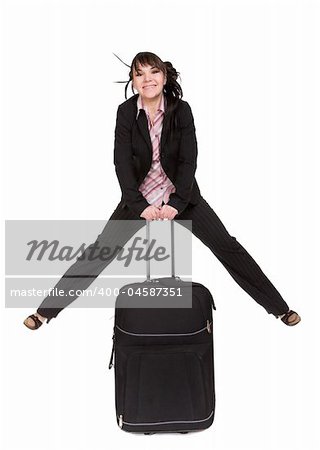 attractive businesswoman traveling with suitcase