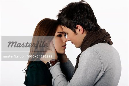 Attractive couple passionately in love looking into each others eyes