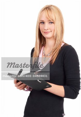 Beautiful blonde businesswoman writing in her daybook. Isolated on white background