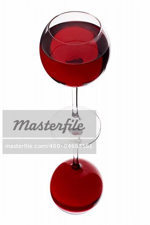 A glass of red wine, isolated on a white background.