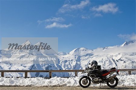 Motorbike in Grossglockner high alpine road, National Park Hohe Tauern, Austria