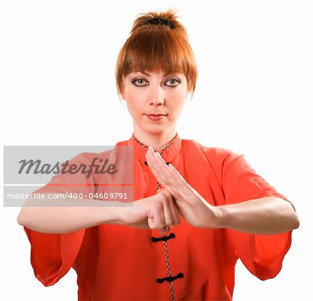 young woman makes chinese greeting gesture isolated with clipping path on white background