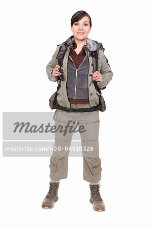 happy brunette woman ready to travel. over white background