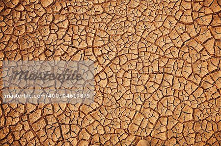 Cracked earth background. Cracked and dried mud texture