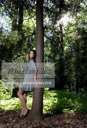 Beauty Woman In The Summer Forest