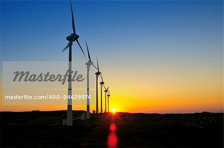 Windmills in the sunset sky energy environments