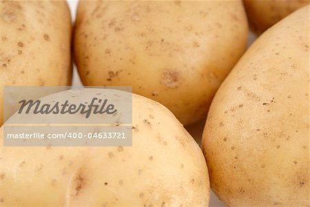 Heap of potato isolated on the white background