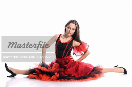 Beautiful girl dances flamenco with acrobatic elements