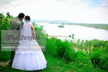 Wedding walk in the park in a sunny summer day