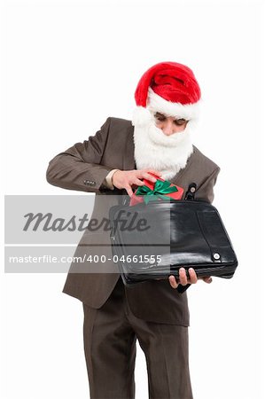 This gift for you. Businessman in suit with santa hat on head. Isolated over white background